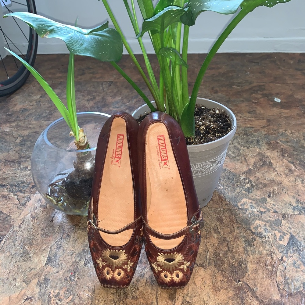 Brown leather flats